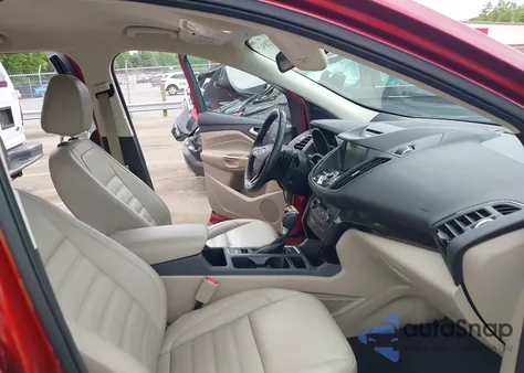 2017 Ford Escape Titanium z USA, uszkodzony, nr VIN 1FMCU0J97HUE84151